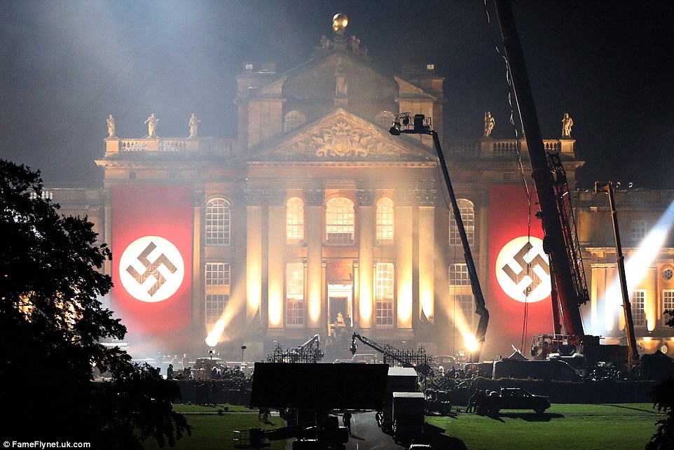 38B6334D00000578-3804595-This_photograph_shows_two_50ft_giant_swastika_flags_hanging_down-a-16_1474675629018.jpg